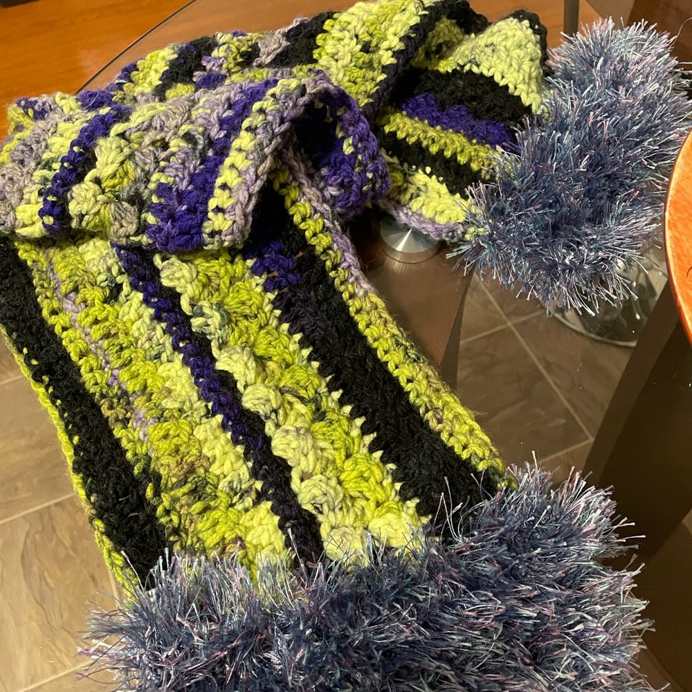 One of a kind crocheted multi stitch scarf.